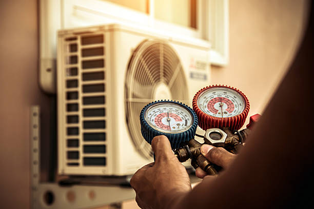 Professional Ac Installation technician working in Pekin, IN